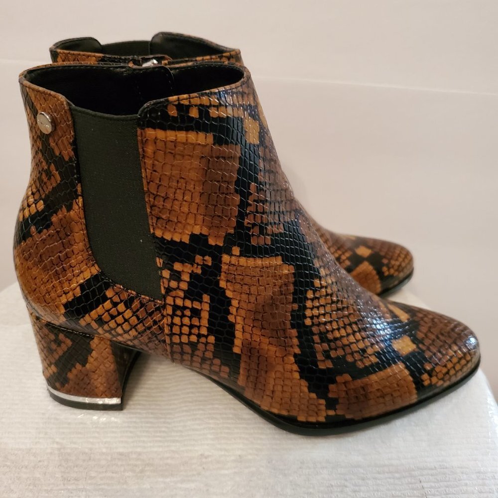 Calvin Klein Ankle length booties feature a trendy animal print design Size 6.5